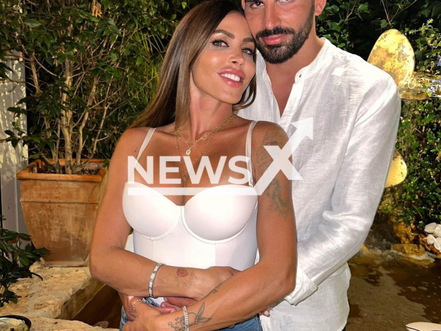 Guendalina Tavassi and her boyfriend Federico Perna pose in undated photo. They  revealed in an interview with Le that they would have sex four times a day.  Note: Private photo.  (@guendalinatavassi/Newsflash)