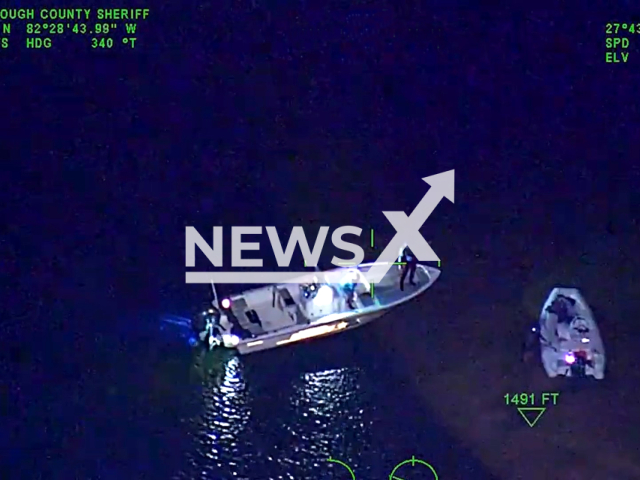 Marine units rescue a 72-year-old man outside the Shellpoint Marina, in Hillsborough County, Florida, on Monday, Mar. 13, 2023. Marine units got the man on board the HCSO vessel, towing him and his boat to safety.  Note: Picture is a screenshot from a video. (@HCSOSheriff/Newsflash)