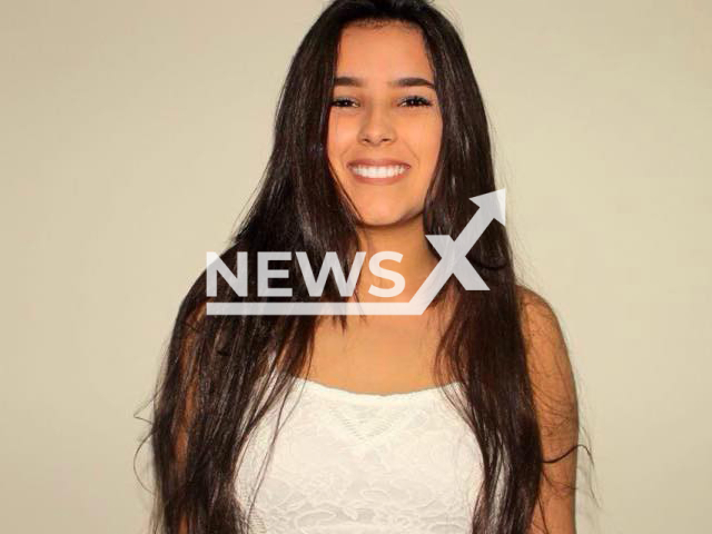 Maria Fernanda Ferreira de Lima, 20, poses in undated photo.  Six men were found guilty of the her death, she was electrocuted at a party in Rio de Janeiro, Brazil,  in 2019.  Note: Private photo.  (Newsflash)