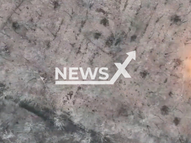 Ukrainian border guards hit Russian military positions by dropping bombs from drones at Bakhmut battlefield in Ukraine in undated footage. The footage was released by the State Border Service of Ukraine on Monday, Mar. 20, 2023.  Note: Picture is screenshot from a video. (@BorderGuardService/Newsflash)