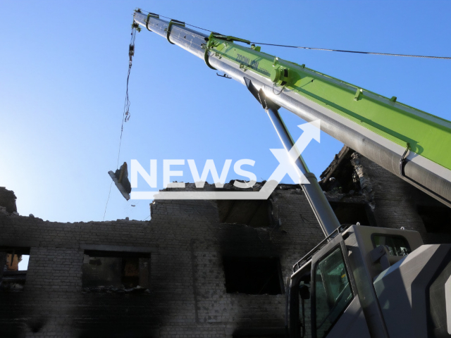 Rescuers continue their work on the 27th day of the war in the Kharkiv region, Ukraine in March 2022. Note: Photo from the State Emergency Service of Ukraine (@MNS.GOV.UA/Newsflash )