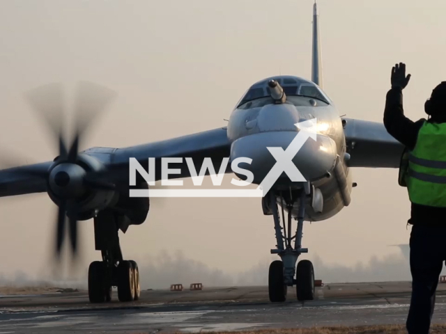 Russian Tu-95MS takes off on a patrol over the neutral waters of the Sea of ​​Japan in undated footage. The footage was released by the Russian MoD on Tuesday, Mar. 21, 2023. Note: Picture is screenshot from a video. (@mod_russia/Newsflash)