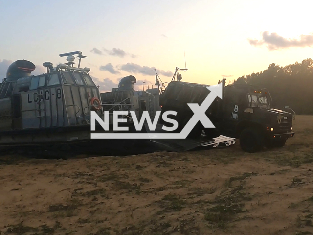 U.S. Navy Sailors and Japan Maritime Defense Force servicemembers pilot landing craft, air cushions from USS Ashland (LSD-48) in order to conduct amphibious operations as part of Iron Fist 23 at Kin Blue Beach, Okinawa, Japan, on Wednesday, Mar. 8, 2023. USS Ashland (LSD-48) is a Whidbey Island-class dock landing ship of the U.S. Navy. Note: Picture is a screenshot from a video (Christopher England; U.S. Marine Corps/Newsflash)