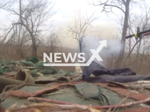 Ukrainian Marines fire from tanks at Russian military positions in Ukraine in undated footage. The footage was released by the 35th separate marine infantry brigade on Tuesday, Mar. 21, 2023. Note: Picture is a screenshot from a video (@35obrmp/Newsflash)