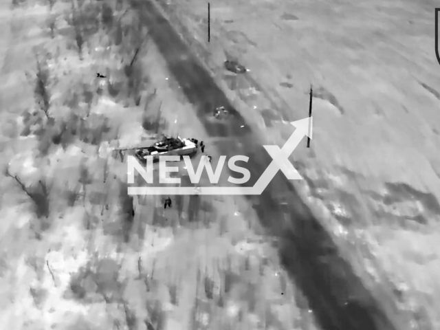 Picture shows Russian soldiers and tank before being hit by the Ukrainian fighters on the battlefield in the Donetsk region in Ukraine in undated footage. The footage was released by the 36th separate brigade of marines on Wednesday, Mar. 22, 2023. Note: Picture is a screenshot from a video (@36obmp/Newsflash)