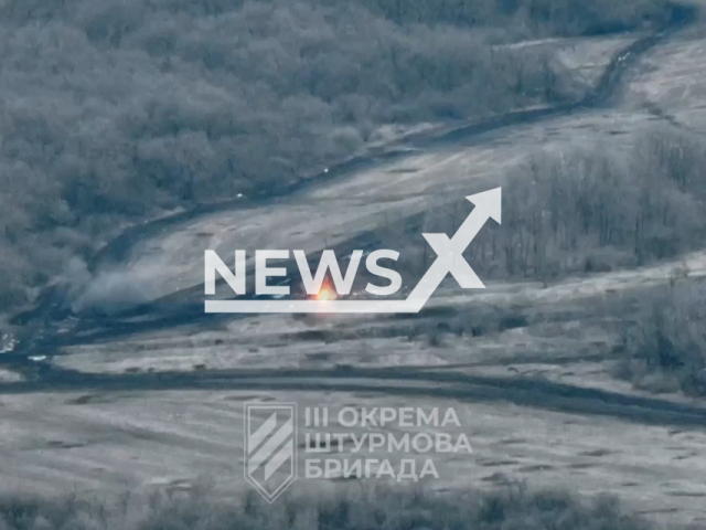 Ukrainian soldiers destroy a Russian ammunition warehouse on the outskirts of Bakhmut in Ukraine in undated footage. The footage was released by the 3th separate assault brigade on Wednesday, Mar. 22, 2023. Note: Picture is a screenshot from a video (@ab3.army/Newsflash)