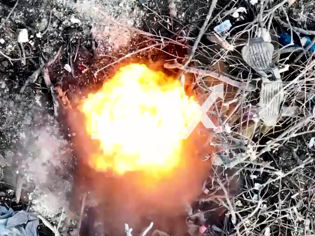 Ukrainian drones drop bombs and destroy Russian soldiers in the trench in Ukraine in undated footage. The footage was released by the First Presidential Brigade on Thursday, Mar. 23, 2023.Note: Picture is screenshot from a video. (NGU3027/Newsflash)