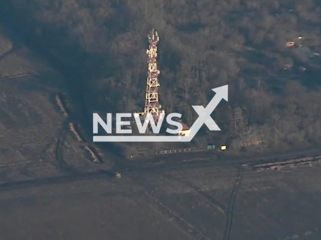 Ukrainian fighters destroy Russian communication tower and the near building in Ukraine in undated footage. The footage was released by the Ground forces of the Armed Forces of Ukraine on Friday, Mar. 24, 2023.Note: Picture is screenshot from a video. (@92OMBr/Newsflash)