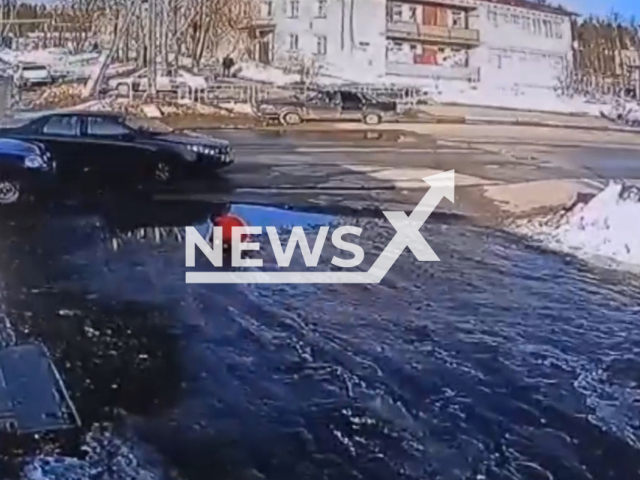 A motorist runs over a child in Sokolskoye, Nizhny Novgorod, Russia, Thursday, March 23, 2023. The child was taken to the hospital with minor injuries and later released home. Note: This picture is a screenshot from the video.(Newsflash)