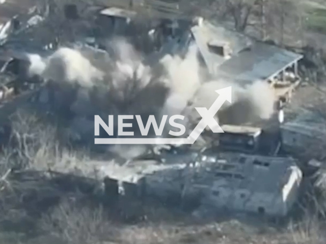 Ukrainian fighters from the 66th separate mechanized brigade destroy Russian military positions in Ukraine in undated footage. The footage was released by the 66th separate mechanized brigade on Monday, Mar. 27, 2023. Note: Picture is screenshot from a video. (@66ombr/Newsflash)