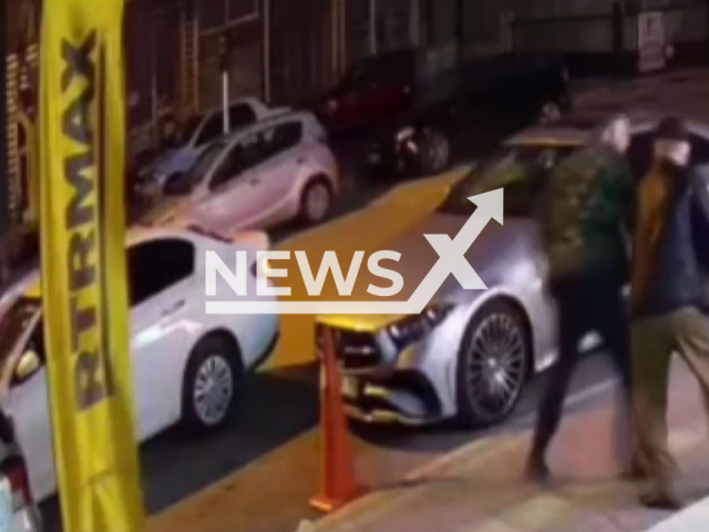 A man shoots another man in the leg and chases him around a car in Kepez, Antalya, Turkey, undated. The man who was injured then drove away with his car. Note: Picture is screenshot from a video. (Newsflash)