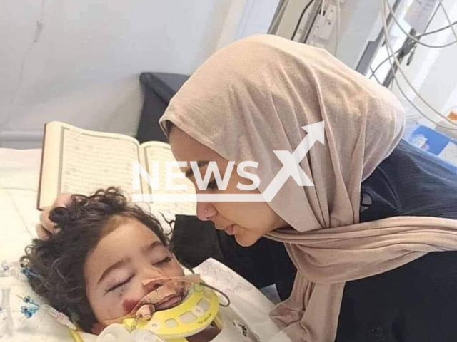 Photo shows the blogger Diana Mohamed with her injured child Rakan, undated. Rakan died after a car accident. Note: Private photo. (Newsflash)