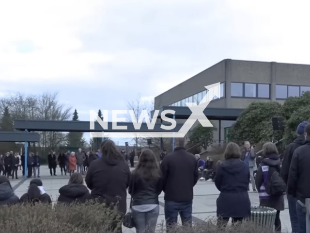 Image shows people paying respect in the schoolyard, undated photo. Luise Frisch, aged 12, was killed by her two best friends in the town of Freudenberg, in North Rhine-Westphalia, Germany. Note: Photo is a screenshot from a video. (Newsflash)