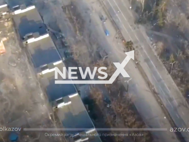 BMD tank of the Russian army being destroyed by the Azov Regiment using sniper fire in Mariupol in Ukraine.
Note: This picture is a screenshot from the video.
(@Polk_Azov/Newsflash)