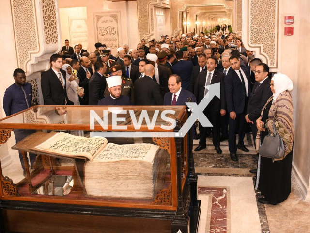 Photo shows the world’s largest Ottoman Quran during the opening of  Egypt's Islamic Cultural Center in the new administrative capital by President Abdel Fattah El-Sisi, undated. The Quran weighs about 80 kilograms and was written with iron ink on parchment in Kufic script. Note: Photo from the spokesman for the Egyptian Presidency. (Spokesman for the Egyptian Presidency/Newsflash)