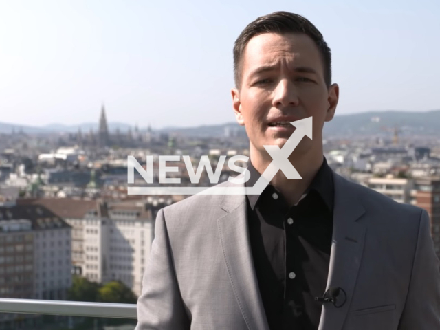 Image shows journalist Michael Pommer, undated photo. He registered a giraffe from the Schoenbrunn Zoo, in the city of Vienna, Austria, for the Social Democratic Party of Austria president applications. Note: Photo is a screenshot from a video. (Newsflash)