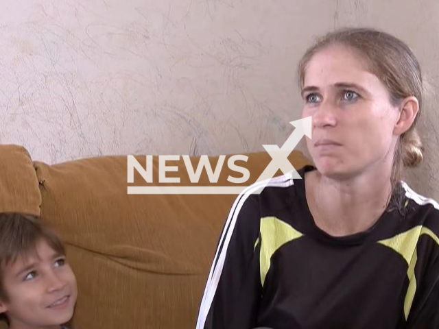 Picture shows Ellen Bonnaci and her son Maicon Douglas, 8, undated. She  could not wake  up her son for school and called an ambulance,  local media reported that the boy pretended to faint to avoid going to school in Maringa, Brazil.  Note: Photo is a screenshot from a video. (Newsflash)