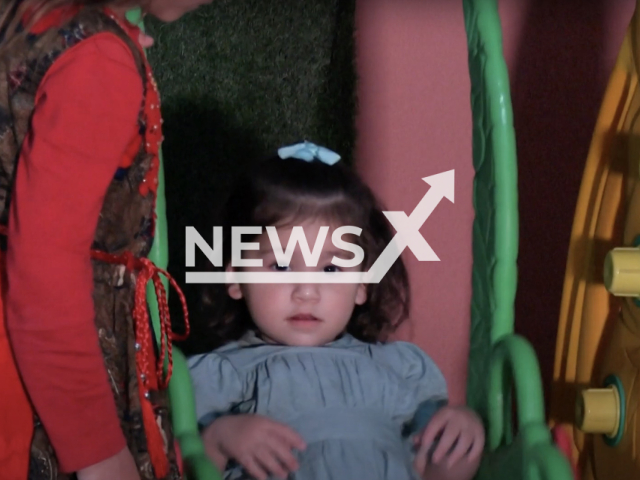 Photo shows an Afghan toddler, named Maryam, undated. Maryam, who was bundled on to an evacuation flight from Kabul in 2021 after her parents died in a bomb blast, has been reunited with relatives at a Qatar orphanage. Note: Picture is a screenshot from a video (Newsflash)