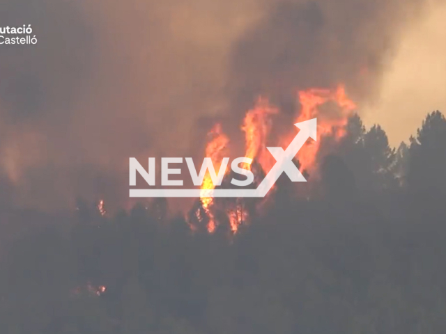 Picture shows the scene of the fire in Villanueva de Viver, a municipality in the comarca of Alto Mijares, Castellon, Valencia, Spain, undated footage. The flames have surrounded Montan and force the eviction of three more towns. Note: Picture is screenshot from a video. (Diputacio de Castello/Newsflash)