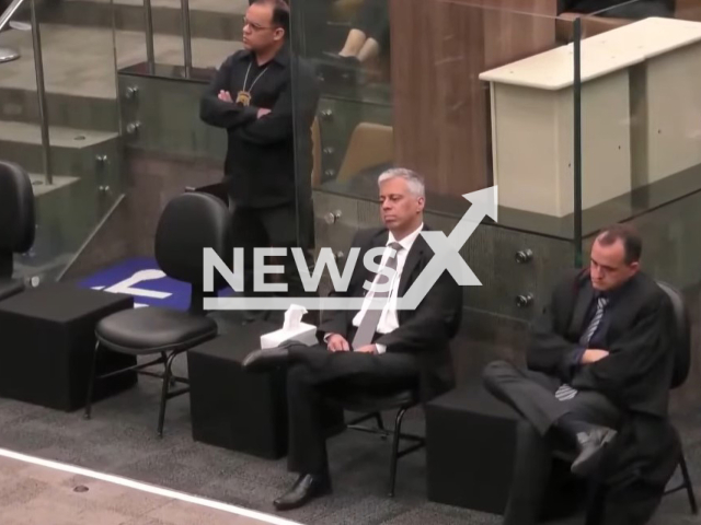 Picture shows Andre Luiz Garcia de Pinho, 53, (middle) during trial for the death of his wife Lorenza Maria Silva de Pinho, 41, in Belo Horizonte, Brazil on Wednesday, Mar. 29, 2023. He was sentenced to 22 years in prison in a closed regime for qualified homicide for the death of his wife. Note: Photo is a screenshot of video. (Newsflash)