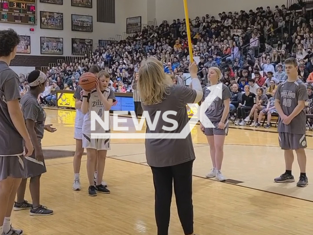 Jules Hoogland, a blind teenager received applause after successfully scoring during a high school basketball game, on 22nd March, in Zeeland, Michigan. Note: Picture is a screenshot from a video (@zpsfuture/Newsflash)