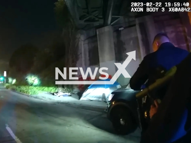 Picture shows an officer's point of view of the officer-involved shooting that occurred in Los Angeles, California, on Wednesday, Feb. 22, 2023. The suspect, Mariela Cardenas, was struck by gunfire and later pronounced deceased at a local hospital. Note: Picture is a screenshot from a video (@LAPDHQ/Newsflash)