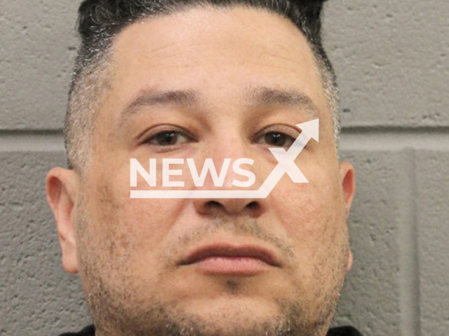 Angel Reyes, aged 44, poses in undated photo. He is accused of using fraudulent checks to buy at least five luxury cars at dealerships in the city of Houston, Texas State, USA. Note: Licensed content. (Houston Police Department/Newsflash)