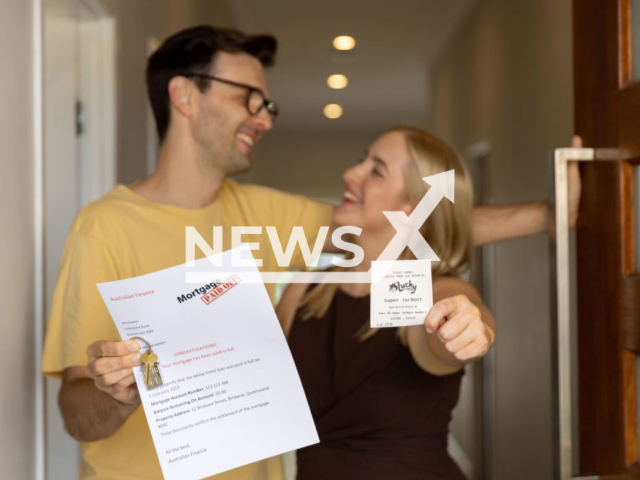 Picture shows a woman holding a Lucky Lotteries Super Jackpot ticket and a man, undated.  A Revesby man won AUD 100 thousand (GBP 54 thousand) on the Lucky Lotteries Super Jackpot draw.
  
Note: Licensed photo.  (The Lott/Newsflash)