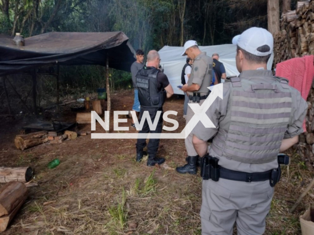 Police officers work at the crime scene in Nova Petrópolis, Brazil on Saturday, Apr. 1, 2023. They rescued four Argentines who worked in slavery conditions in southern Brazil .Note: Photo obtained from the Military Brigade of Rio Grande do Sul. (Military Brigade/Newsflash)