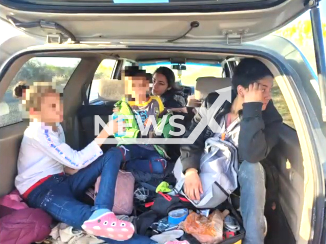 The picture shows the illegal immigrants discovered during a traffic st in Kinney County, Texas, USA on March 23, 2023. The driver, an illegal immigrant from Guatemala, was arrested and charged with smuggling of persons and smuggling of persons under the age of 18. Note: Police picture.  (Texas Department of Public Safety/Newsflash)