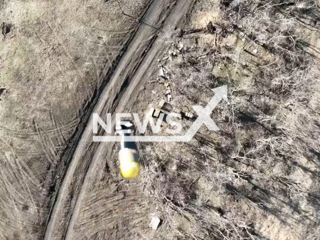 Ukrainian drones drop bombs on the Russian military positions in the tranches on the frontline in Ukraine in undated footage. The footage was released by the 72nd of the separate mechanized brigade on Monday, Apr. 03, 2023. Note: Picture is a screenshot from a video (@72.brigade.best/Newsflash)