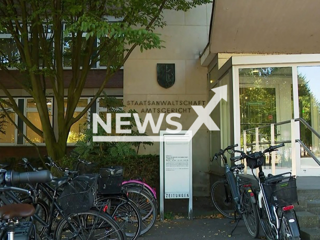 Image shows the Muenster District Court, North Rhine-Westphalia, Germany, undated photo. Dennis Holstein, 26, sentenced to life for killing Pia Stezler,, 25, and hiding her body in a bush on Tuesday morning, Aug. 30, 2022. Note: Photo is a screenshot from a video. (Newsflash)