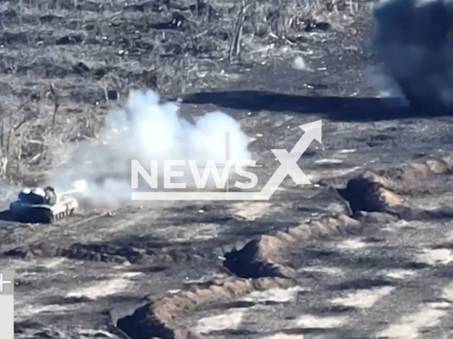 Ukrainian soldiers with the support of a tank and an armored personnel carrier destroy the Russian military trench position in Ukraine in undated footage. The footage was released by the 5th separate assault brigade on Tuesday, Apr. 04, 2023. Note: Picture is a screenshot from a video (@5th.SAB/Newsflash)