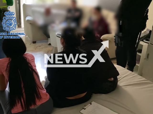 Picture shows the women recused during the operation  in Malaga, Spain, undated. Police rescued 20 women forced into prostitution and  selling drugs to clients, and arrested 34 people.  Note: Picture is a screenshot from a video (Newsflash)