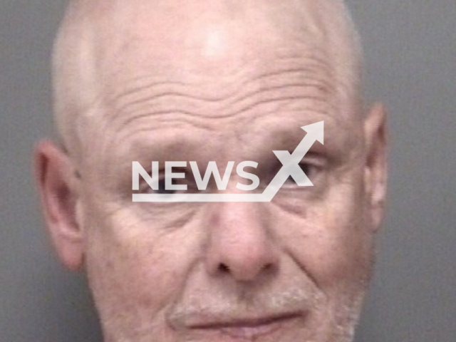 Joel Wagner, aged 59, poses in undated photo. He was arrested and charged with murder after killing a woman with a crossbow in the city of Battle Creek, in Calhoun County, Michigan State, USA. Note: Licensed content. (Calhoun County Jail/Newsflash)