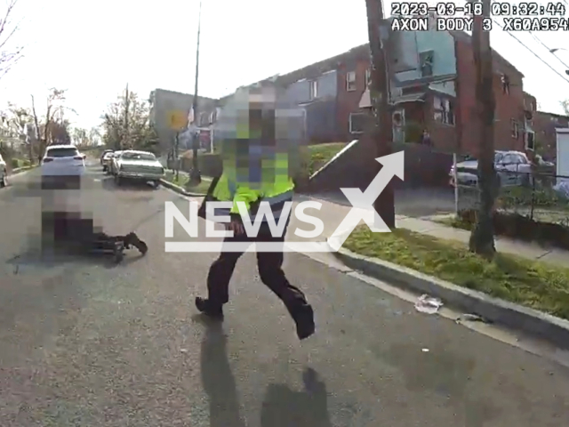 A police officer shots the driver in Washington, DC, USA on March 18, 2023. The driver, identified as 17-year-old Dalaneo Martin by family members, died at the scene. Note: This picture is a screenshot from the video. (OfficialDCPolice/Newsflash)