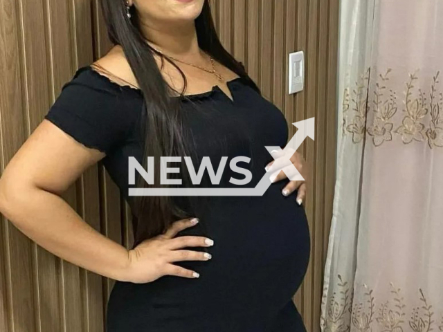 Pregnant Elaine Ellen Ferreira Vasconcelos, 32, poses in undated photo. She died after receiving an injection of vitamin cocktail at pharmacy in Cuiaba, Brazil. Note: Private picture. (Newsflash)