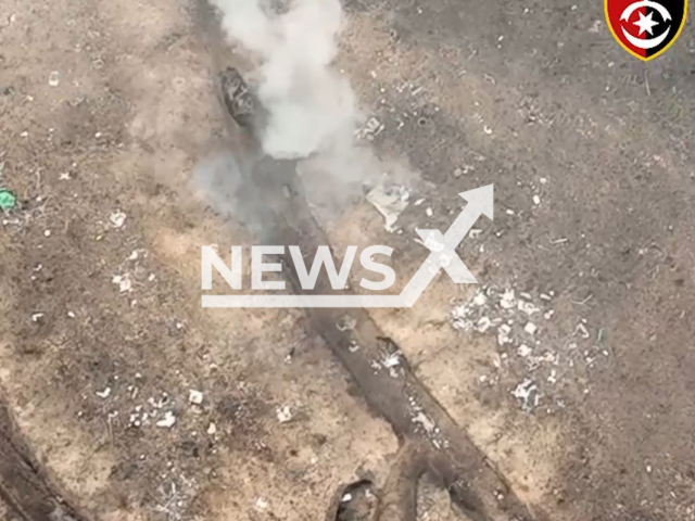 Ukrainian drones drop bombs at the Russian soldiers in the trench in Ukraine in undated footage. The footage was released by the 30th separate mechanized brigade on Thursday, Apr. 06, 2023.Note: Picture is screenshot from a video. (@30brigade/Newsflash)