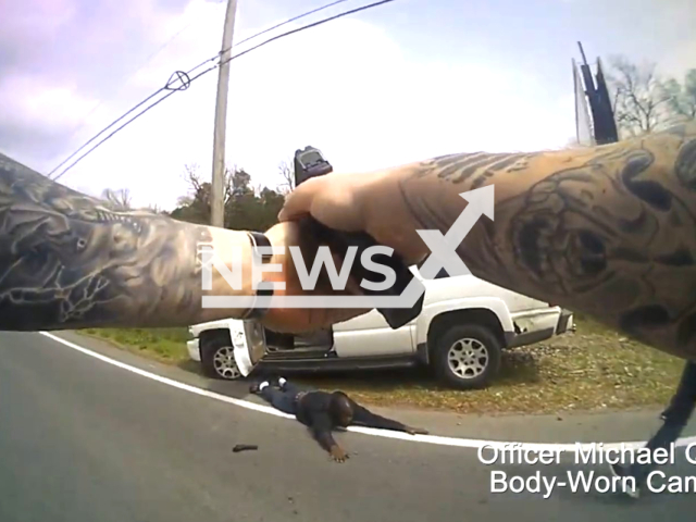 Picture shows Officer Michael Quinn's point of view of an incident that occurred on Dickerson Pike, in Nashville, Tennessee, on Tuesday, Apr. 4, 2023. The suspect, Demond Buchanan, 45, had more than a dozen warrants out for his arrest. Note: Picture is a screenshot from a video. (Metropolitan Nashville Police Department/Newsflash)