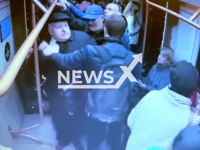 Man argues with a 65-year-old man on a subway ride from Krasnopresnenskaya to Belorusskaya, in Moscow, Russia, on April 4, 2023. The young man ended up pepper-spraying the pensioner. Note: Picture is a screenshot from a video (Moscow Police)