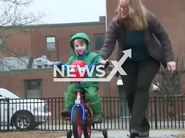 Picture shows the boy, 3, with an unidentified woman and with his Spiderman bike, donated by homeless woman, undated.
An anonymous homeless woman bought a bike and dropped it off at the Rockland police station for a boy, 3, after his was stolen.  
 Note: Photo is a screenshot from a video. (Newsflash)