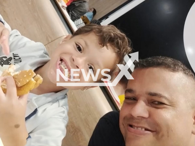 Isaac Anthony Alves Vital de Souza, 5, and his father Davi Vital de Souza  pose  in undated photo. His mother was arrested in Osasco, Brazil,  on Friday, April 7, 2023.
 Note: Private photo.  (Newsflash)