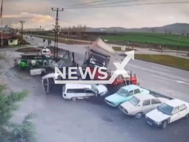 A lorry overturns in Gumushacikoy, Amasya, Turkey, undated. Two people were injured following the incident.Note: Picture is screenshot from a video. (Newsflash)