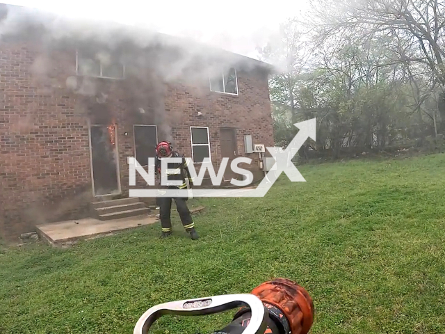 Picture shows the scene of the housefire, in Fort Smith, Arkansas, undated. Fortunately, no injuries were reported from the fire. Note: Picture is screenshot from a video. (Fort Smith Fire Department/Newsflash)