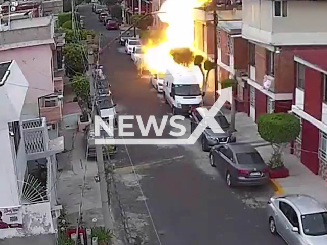 Picture shows an explosion in Nezahualcoyotl, Mexico, on Sunday, April 9, 2023. A man walking down the street was knocked down by the explosion caused by  gas accumulation. Note: Picture is screenshot from a video. (Newsflash)