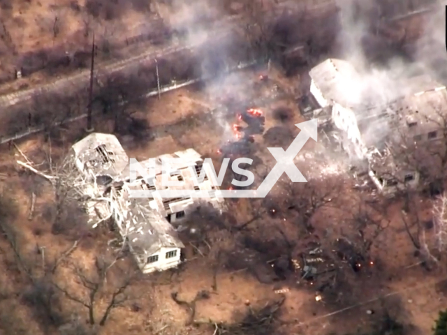 Ukrainian fighters destroy Russian military equipment in Ukraine in undated footage. The footage was released by 35th separate marine infantry brigade on Tuesday, Apr. 11, 2023. Note: Picture is screenshot from a video. (@a1108br/Newsflash)