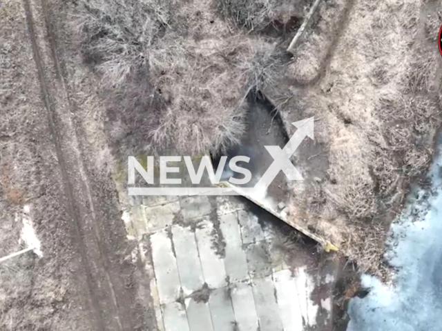 Ukrainian drones drop bombs on the Russian soldiers on the frontlines in Ukraine. The footage was released by the 110th separate mechanized brigade on Wednesday, Apr. 12, 2023. Note: Picture is screenshot from a video. (@110separatebrigade/Newsflash)