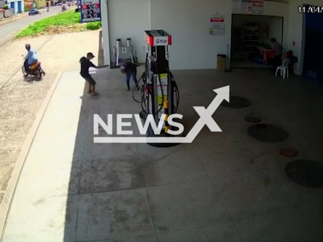 Marcos Gustavo Laviola Nobre  shoots his ex Aline Vasconcelos da Silva  at a gas station in Parnaiba, Brazil, on Tuesday, April 11, 2023. She had left from Fortaleza, Brazil, three months ago due to the threats  from her ex. Note: Picture is screenshot from a video. (Newsflash)