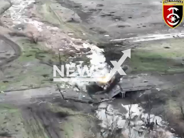 Ukrainian fighters storm the Russian stronghold with artillery in Ukraine in undated footage. The footage was released by 30th separate mechanized brigade on Wednesday, Apr. 12, 2023.
Note: This picture is a screenshot from the video. (@30brigade/Newsflash)