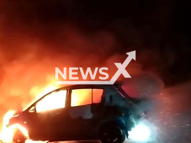 Firefighters put out a car fire in Azerbaijan in undated footage. There were a total of 28 fires on the same day, including this car fire as well as another one. Note: Picture is screenshot from a video. (@azerbaycanfhn/Newsflash)